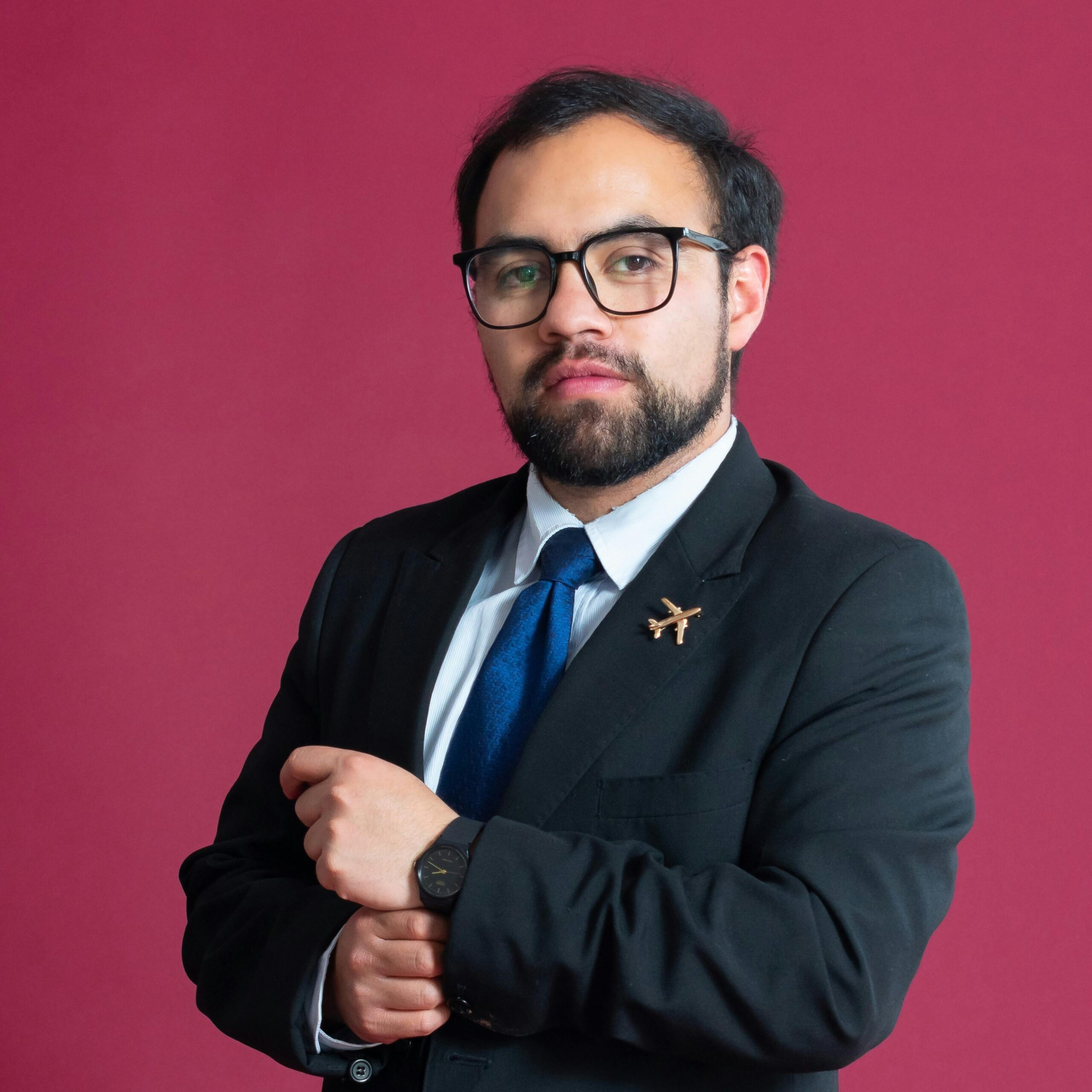Confident businessman wearing a suit and tie, showcasing professionalism and style.